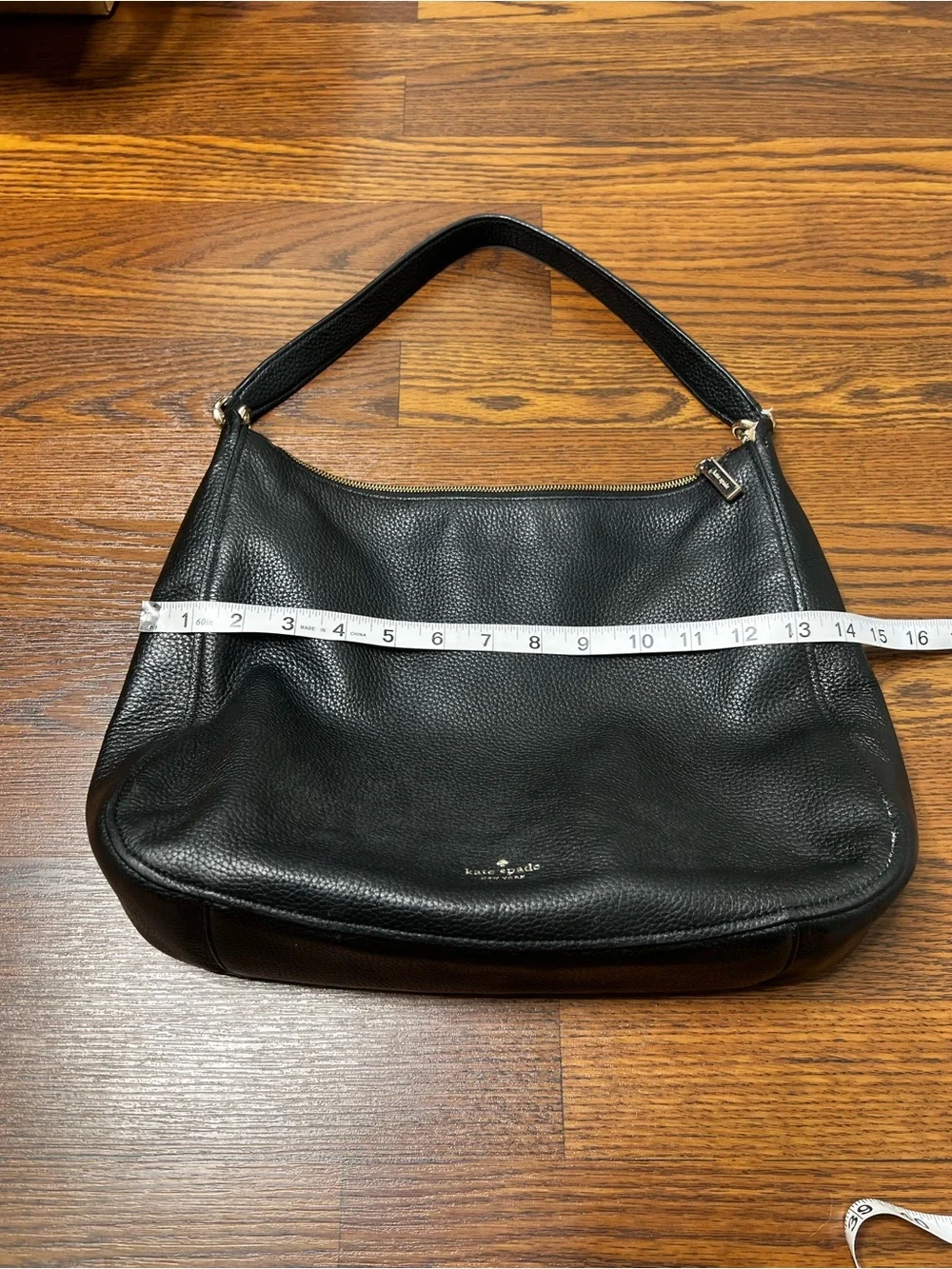 Kate Spade Kailee Shoulder Bag, crafted from black pebbled leather